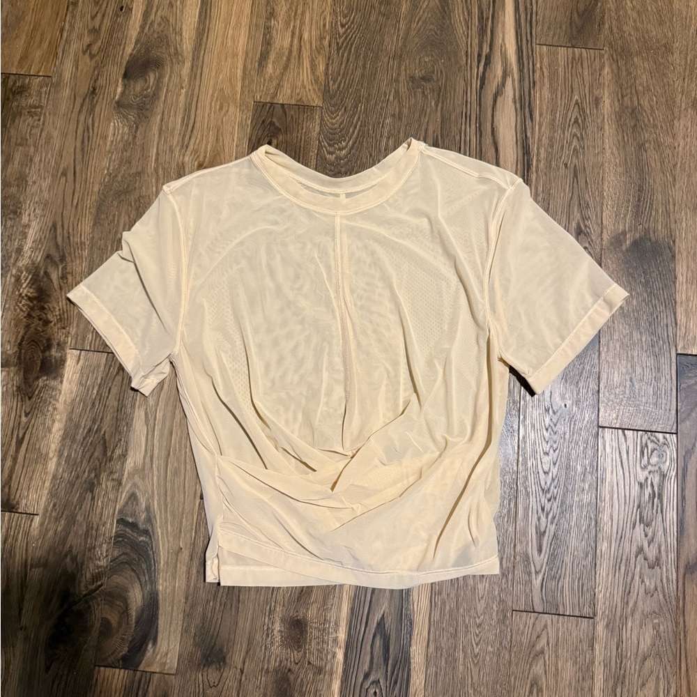 Lululemon size 6 cream sheer top. Excellent condition